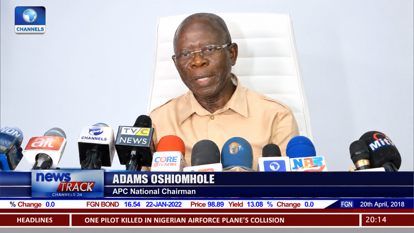 image of adams oshomole addressing the press